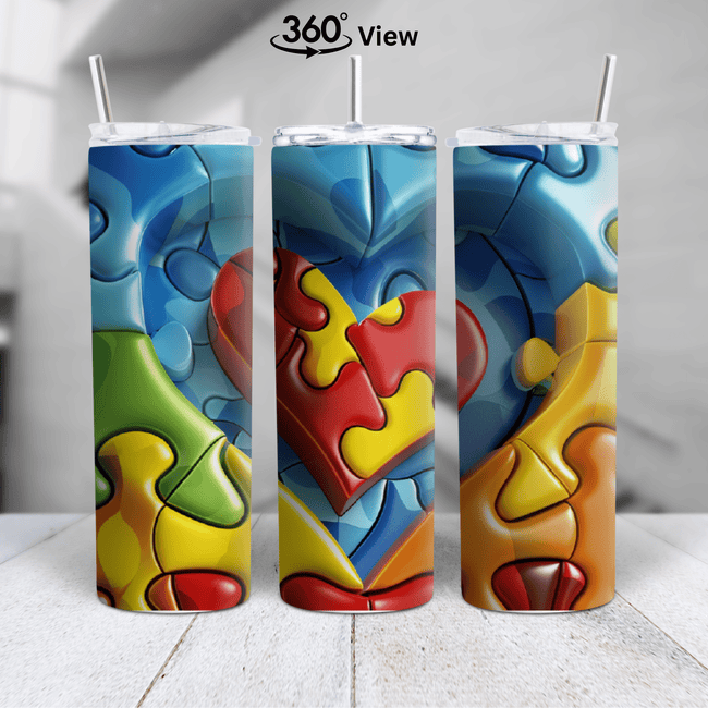 3D autism puzzle heart tumbler with colorful puzzle pieces in a full-wrap insulated design.