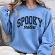 Carolina blue Spooky Season crewneck sweatshirt with black collegiate graphic for Halloween lovers and autumn wear