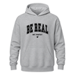 Grey motivational hoodie featuring black Be Real Not Perfect statement design and heart graphic