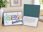 Colorful handmade Happy Birthday greeting card featuring layered cardstock letters, elegant die cut script, premium paper, and heartfelt birthday message.