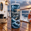 Inspirational lighthouse skinny tumbler with Weather the Storm quote, dramatic blue ocean artwork, clear lid and straw