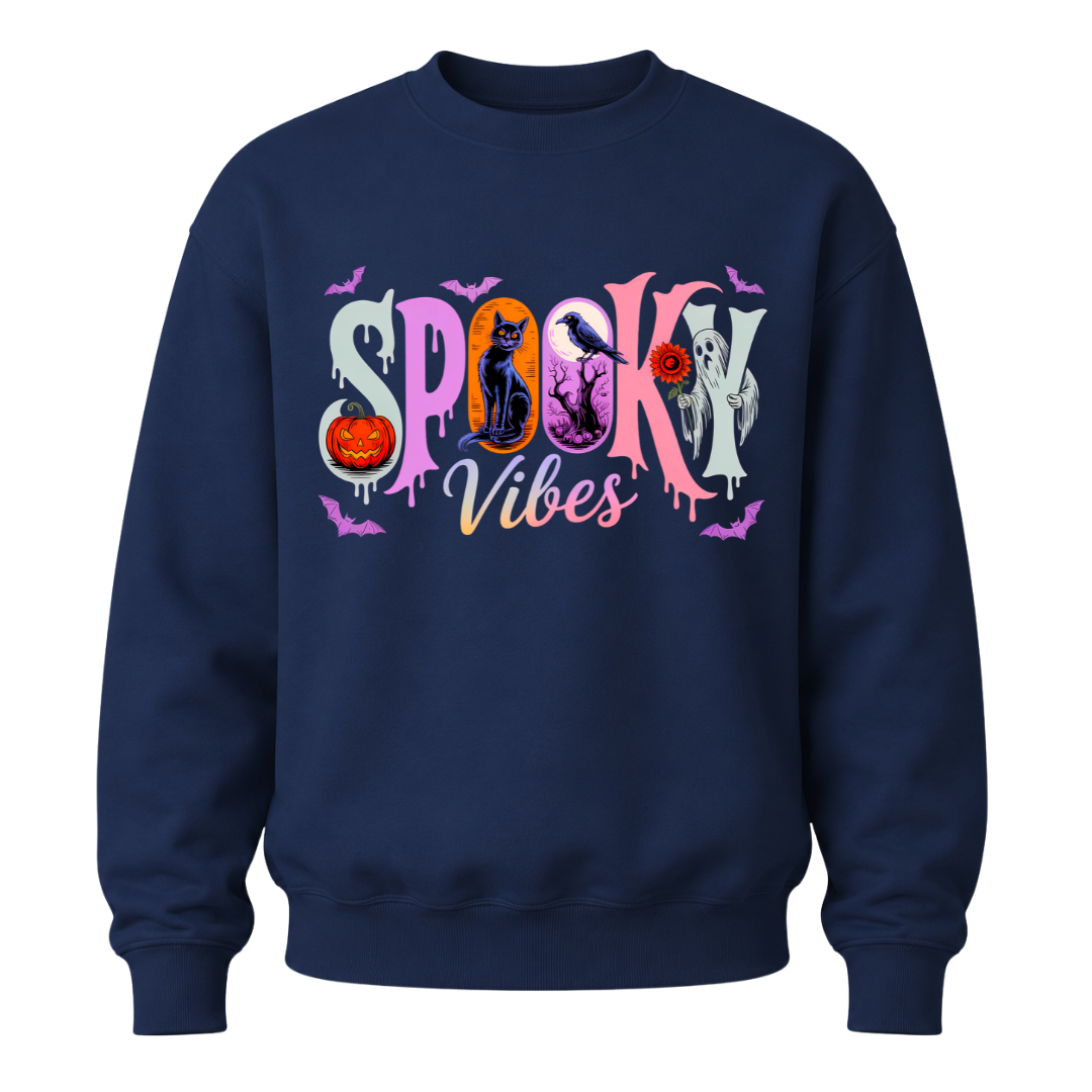 A navy blue crewneck sweatshirt featuring a colorful 'Spooky Vibes' graphic on the chest with Halloween-themed illustrations.