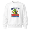 White youth crewneck sweatshirt featuring a cute dinosaur holding a cookie and juice box with I'm Just Here for Recess and Snacks school graphic