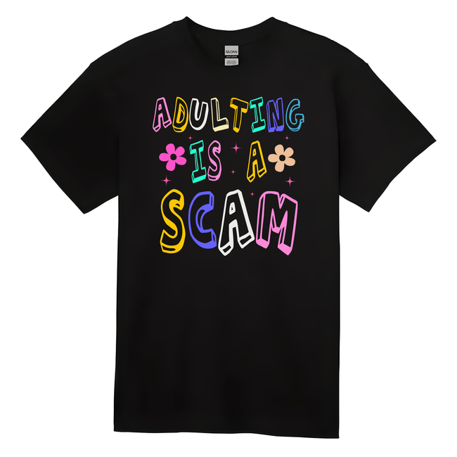 Funny ‘Adulting Is a Scam’ T-shirt with colorful retro letters and flower graphics. Perfect sarcastic tee for adults.