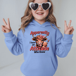 Carolina blue kids hoodie with funny cow illustration and playful attitude slogan for girls