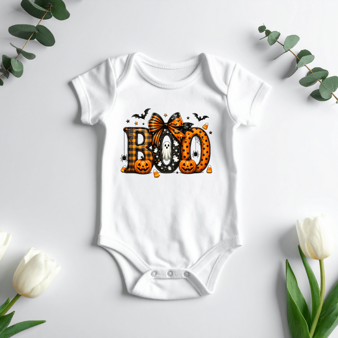 Cute baby first Halloween outfit with Boo ghost pumpkin graphic designed for Halloween photos and pumpkin patch visits