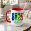 Red interior and handle Believe paranormal mug featuring alien, UFO and Bigfoot artwork for science fiction and cryptid fans.