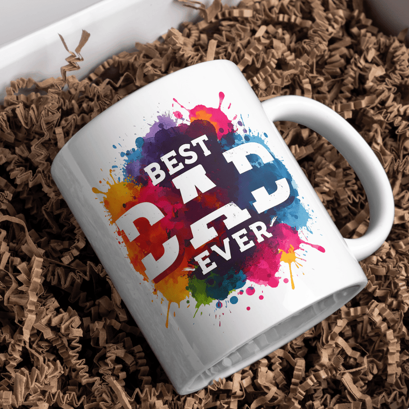 White ceramic Best Dad Ever coffee mug featuring colorful paint splash artwork and bold typography