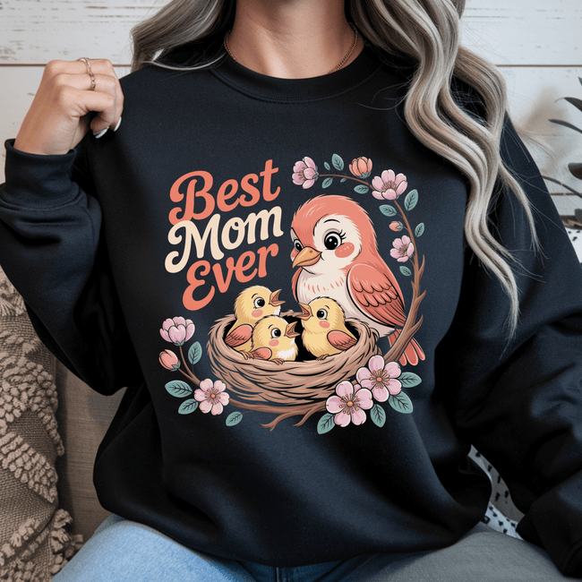 Black crewneck showcasing bold floral artwork and mother bird illustration.