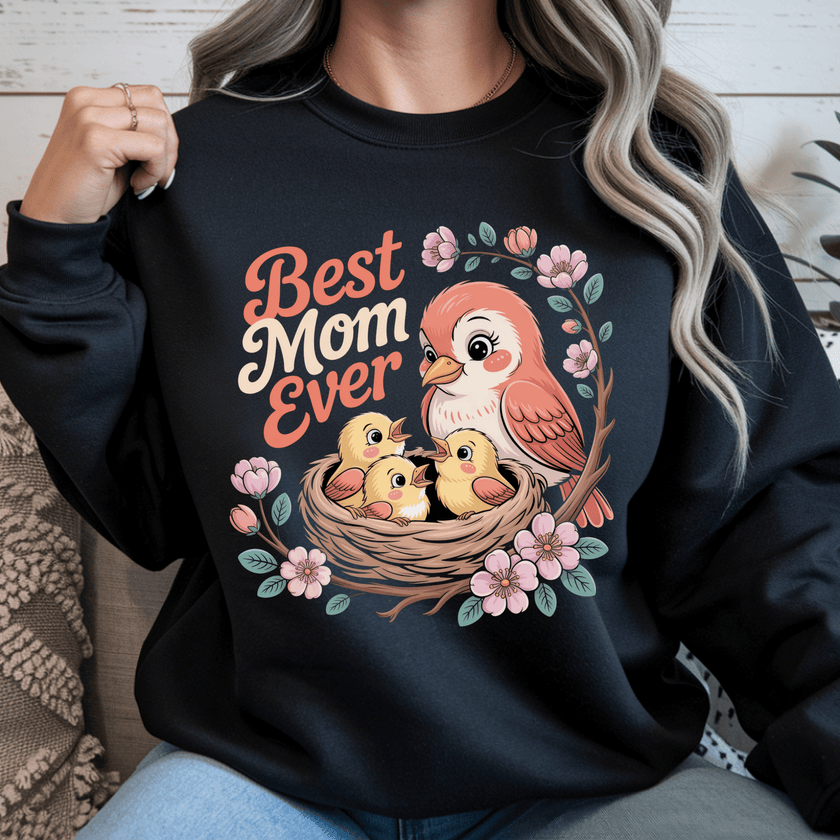 Black crewneck showcasing bold floral artwork and mother bird illustration.