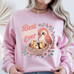 Light pink crewneck with vibrant Best Mom Ever design and illustrated bird family.