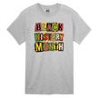 Gray t-shirt with 'Black History Month' text in colorful letters on a white background