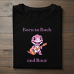 Close-up of kids cartoon dinosaur graphic on music-themed t-shirt.