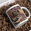 Mug with decorative design and 'Boss Lady' text on a brown textured surface