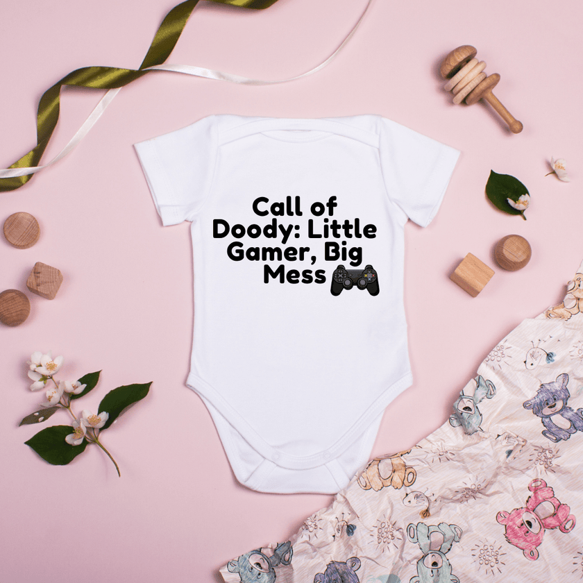 Funny baby outfit with game controller and Doody pun for baby showers