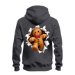 Dark heather gingerbread Christmas hoodie with large cheerful gingerbread man and torn paper illusion on the back.