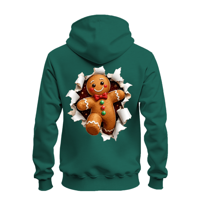 Forest green holiday hoodie featuring an oversized gingerbread man bursting through torn paper on the back.