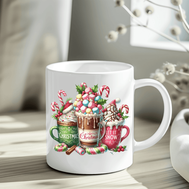 Festive holiday coffee cup featuring three decorated cocoa mugs