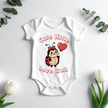 White baby onesie with cute love bug and heart balloon design