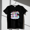 Black kids’ T-shirt with vibrant rainbow unicorn illustration, high-contrast design ideal for girls’ outfits.