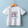 White kids’ T-shirt with a colorful kawaii rainbow unicorn graphic, designed for girls who love magical and cute characters.