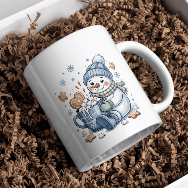 Cute snowman holding a hot cocoa mug with marshmallows on a white ceramic cup.