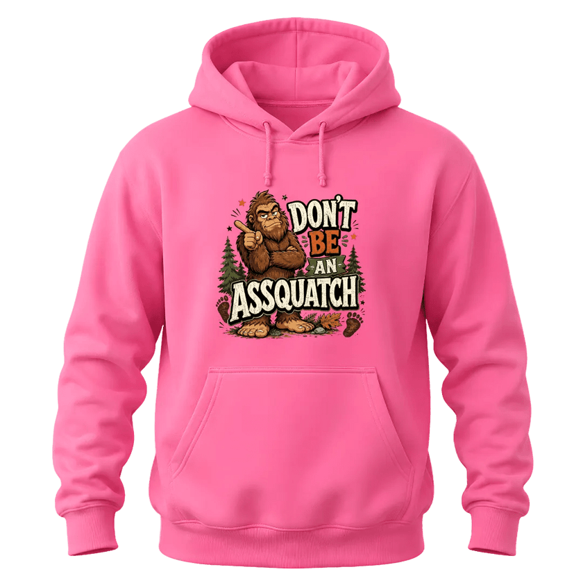 Azalea pink hoodie with playful Don’t Be An Assquatch Sasquatch artwork, forest accents, and bold graphic print.