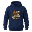 Navy hoodie with Don’t Be An Assquatch text, humorous Bigfoot character, pine trees, and bold outdoor style.