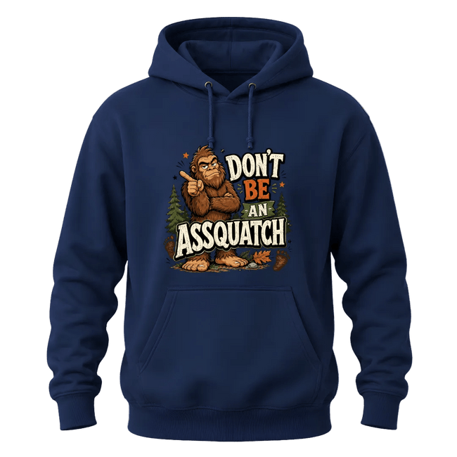 Navy hoodie with Don’t Be An Assquatch text, humorous Bigfoot character, pine trees, and bold outdoor style.