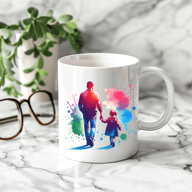 Artistic father and daughter coffee cup with bright watercolor paint design displayed on marble countertop