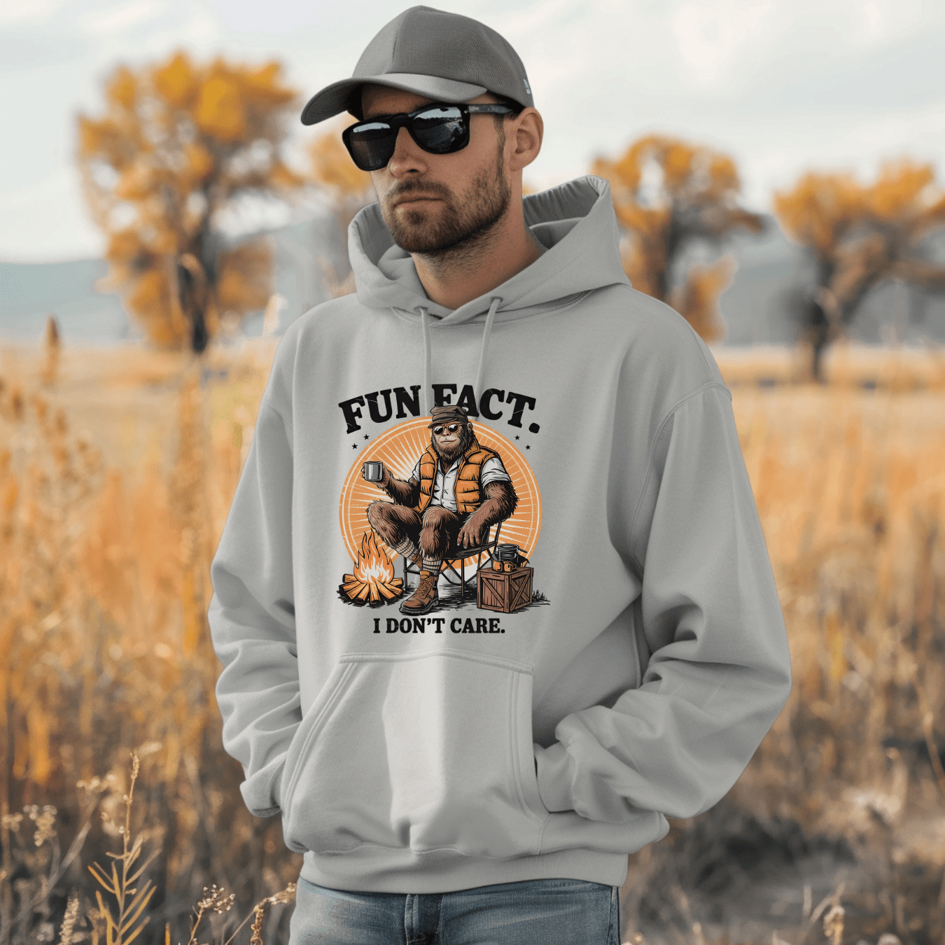 Grey hoodie worn outdoors featuring funny sarcastic graphic perfect for camping and everyday wear