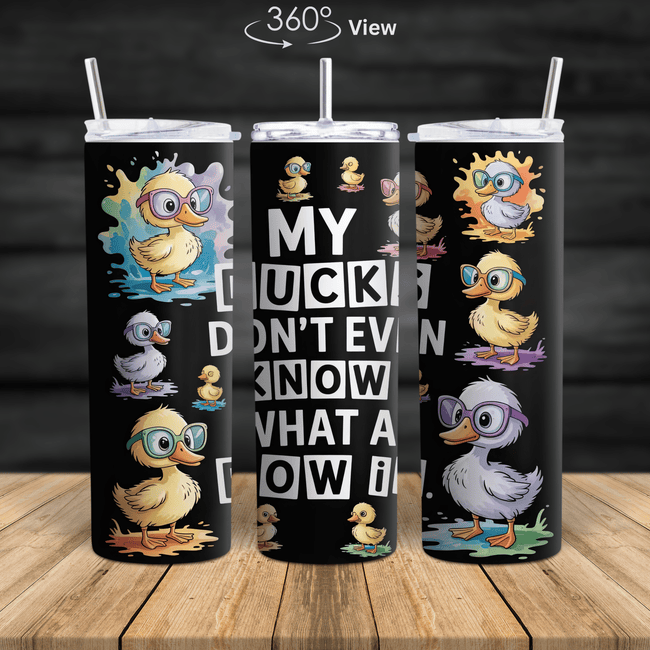 Funny duck tumbler with cute cartoon ducks wearing glasses and the phrase ‘My Ducks Don’t Even Know What a Row Is.’