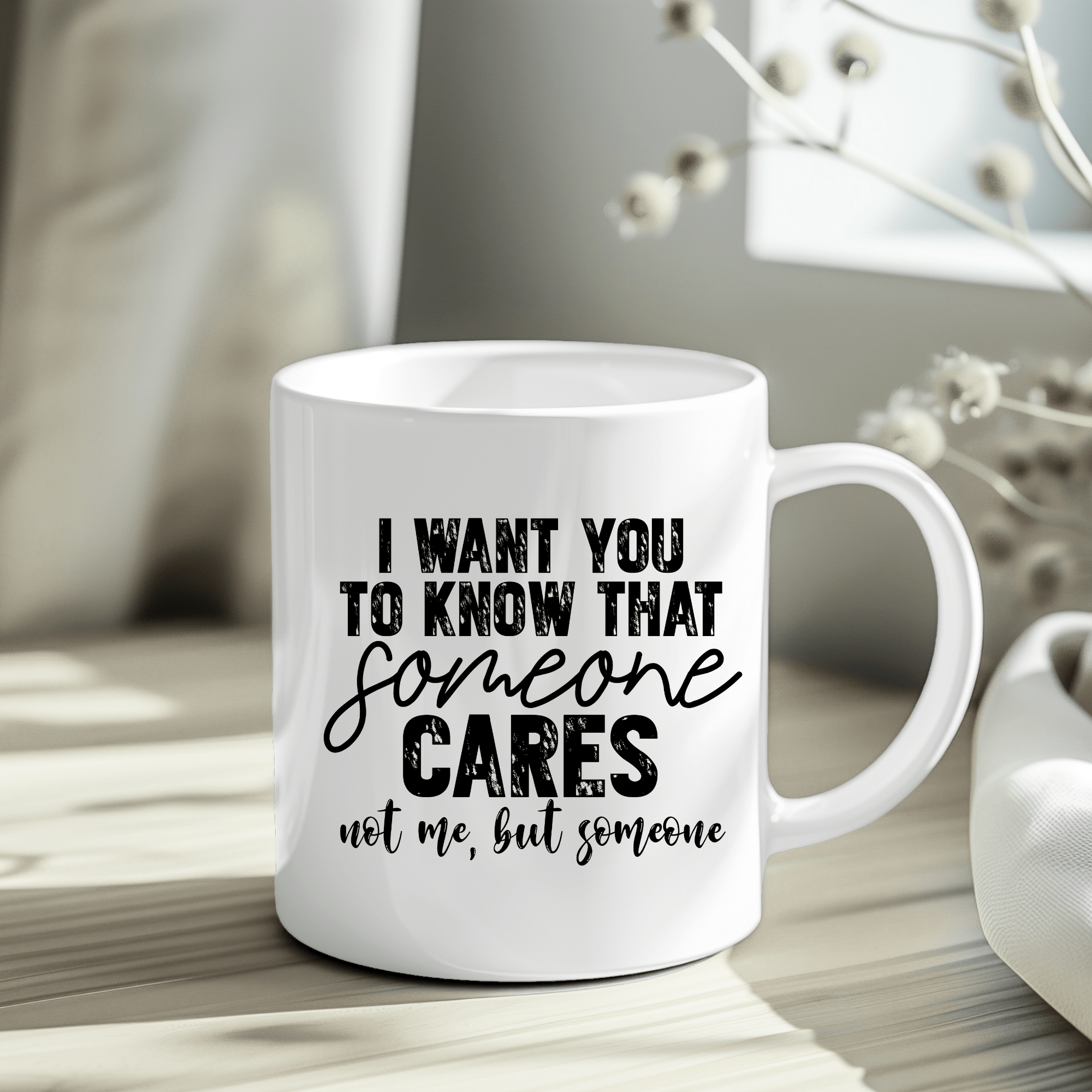 Close-up of a sarcastic humor mug with black typography, shown inside packaging with crinkle paper for gifting.