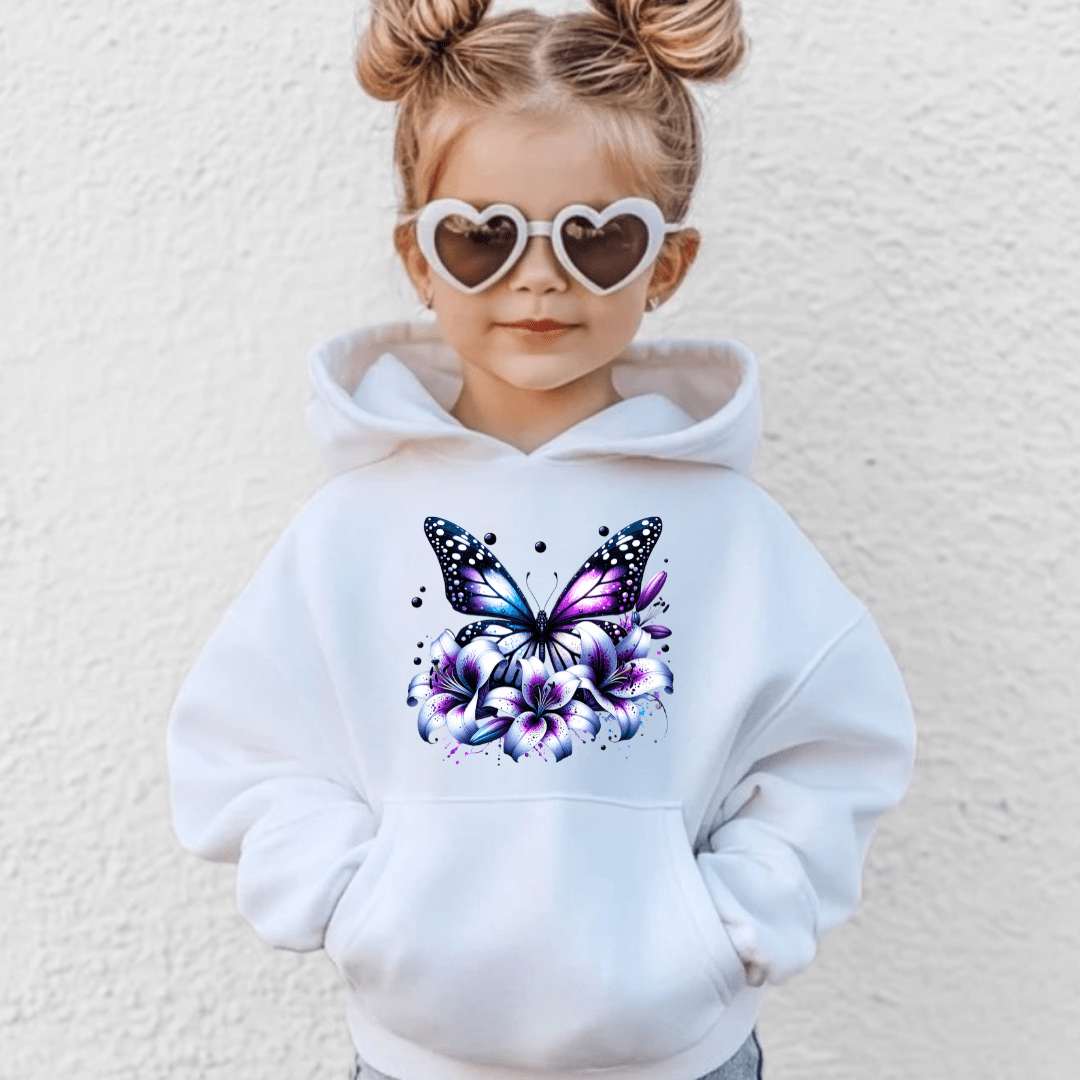 White youth hoodie featuring a vibrant purple and blue butterfly surrounded by floral lilies graphic for girls fashion.