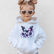 White youth hoodie featuring a vibrant purple and blue butterfly surrounded by floral lilies graphic for girls fashion.