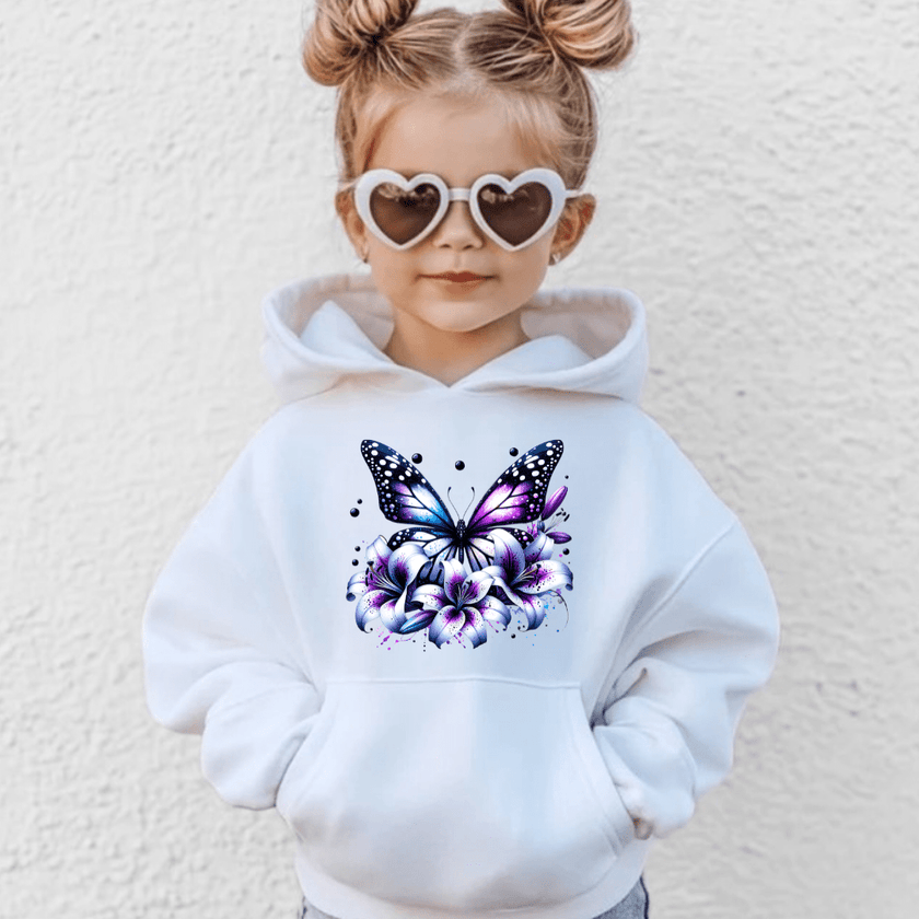 White youth hoodie featuring a vibrant purple and blue butterfly surrounded by floral lilies graphic for girls fashion.