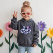 Charcoal gray youth hoodie with artistic butterfly and lily flower design perfect for gifts and seasonal wear.