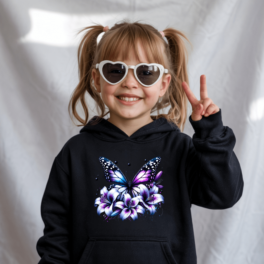Black youth hoodie with vivid butterfly and lily flower graphic creating a bold fashionable look for girls.
