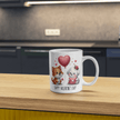 White ceramic Valentine’s Day mug with cute fox and puppy holding hearts