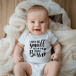 Funny baby boss bodysuit in white with playful typography design for baby shower gift ideas