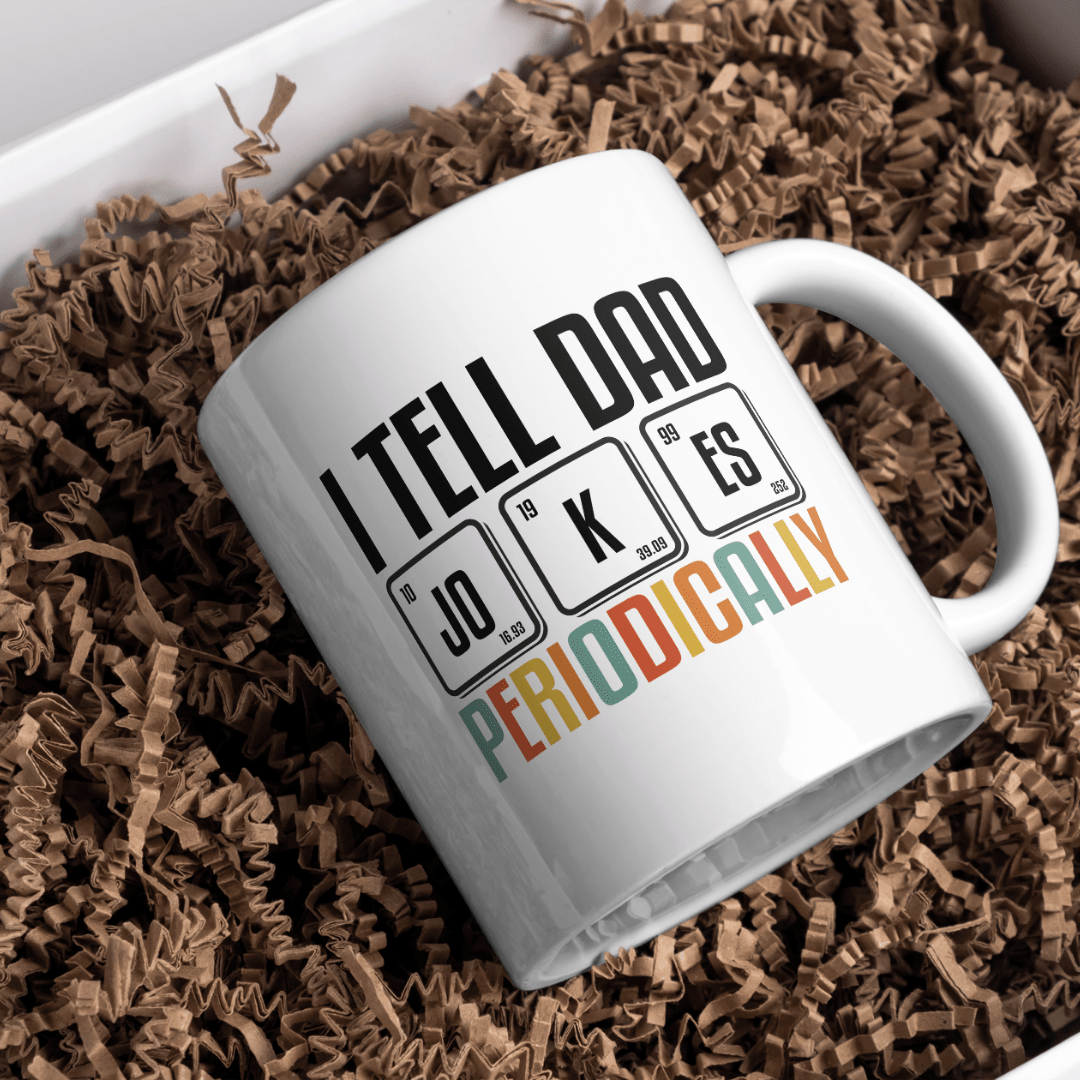 White ceramic coffee mug with I Tell Dad Jokes Periodically design and periodic table inspired humor graphic