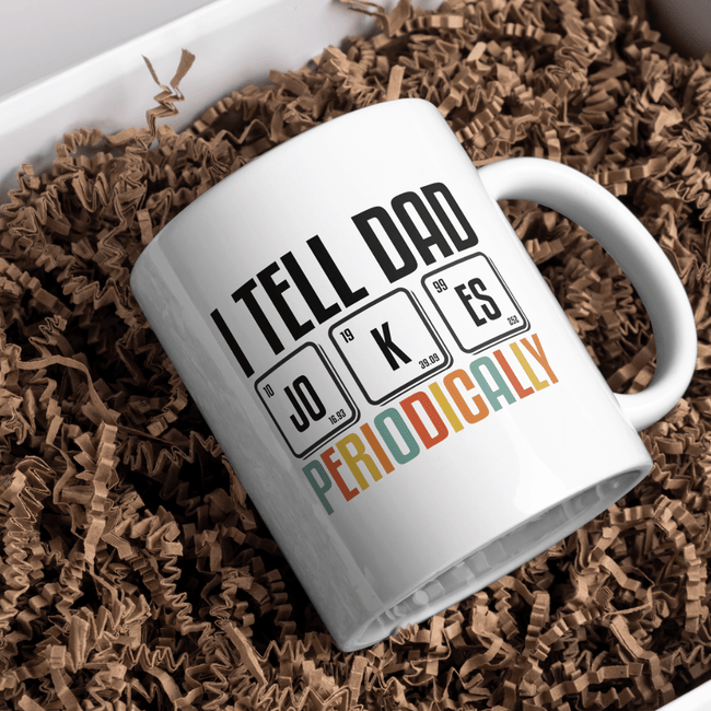 White ceramic coffee mug with I Tell Dad Jokes Periodically design and periodic table inspired humor graphic