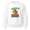 White youth crewneck sweatshirt featuring a cute dinosaur holding a cookie and juice box with I'm Just Here for Recess and Snacks school graphic
