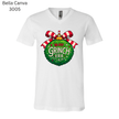 Holiday T-shirt that reads ‘In My Grinch Era’ with a colorful Christmas ornament. Perfect funny tee for cozy winter outfits.