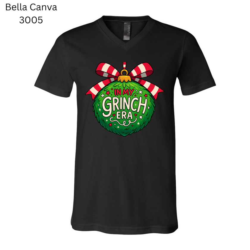 Funny Christmas shirt featuring In My Grinch Era text and holiday ornament design.