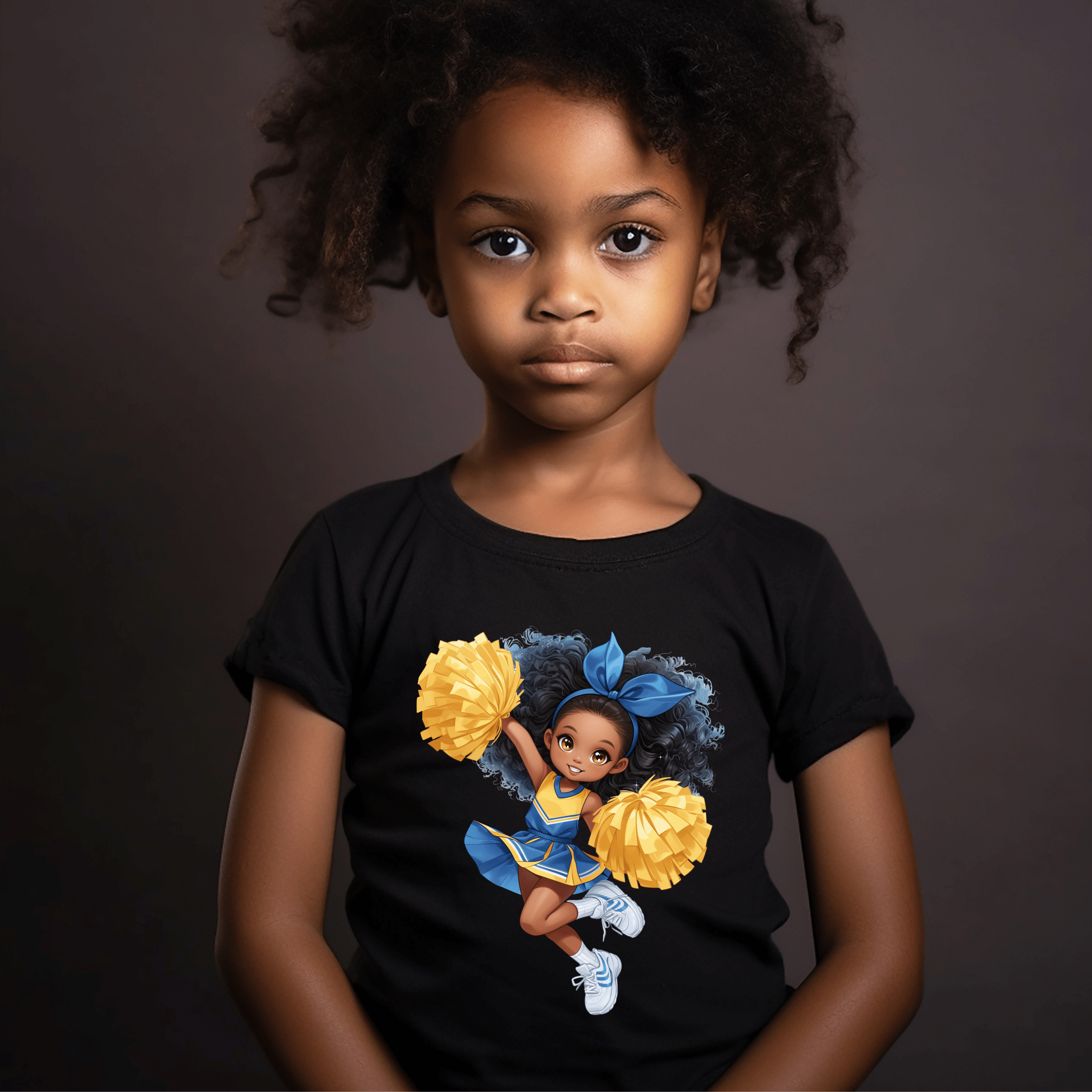 Youth cheer graphic t-shirt product display highlighting colorful cartoon cheerleader artwork.