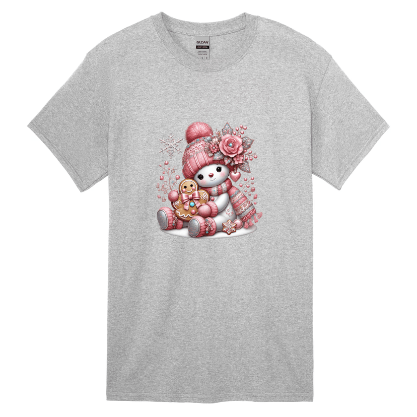 Gray children’s Christmas shirt with pink snowman wearing hat and scarf holding gingerbread.