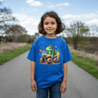 Blue kids T shirt with a colorful dinosaur truck graphic for boys and girls who love adventure themes.
