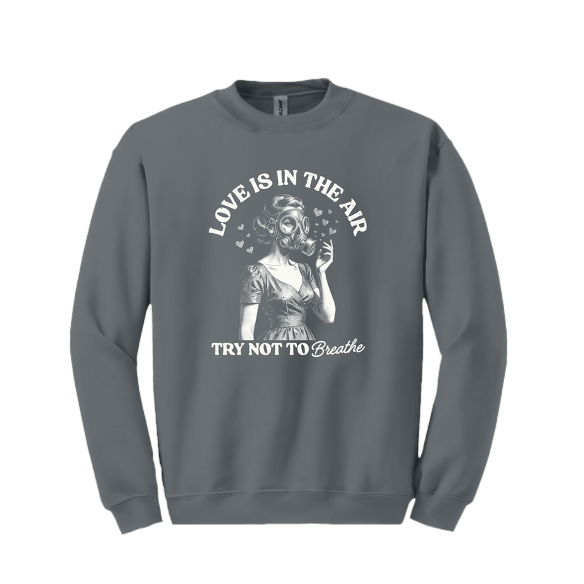 Gray unisex crewneck sweatshirt showing Love Is In The Air funny quote vintage illustration