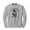 Gray sweatshirt with a graphic design of a woman holding a mask and text 'Love is in the air, try not to breathe' on a white background.